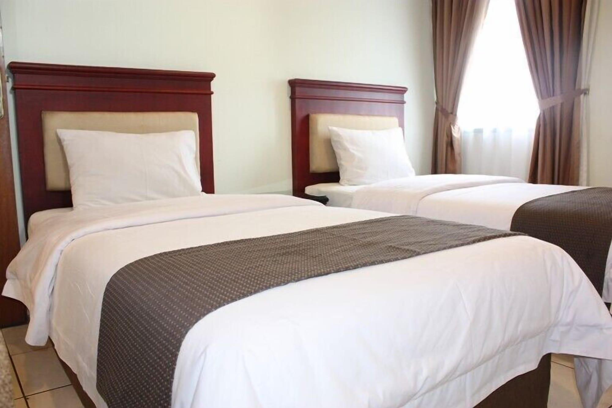 Travellers Suites Serviced Apartments Medan Buitenkant foto