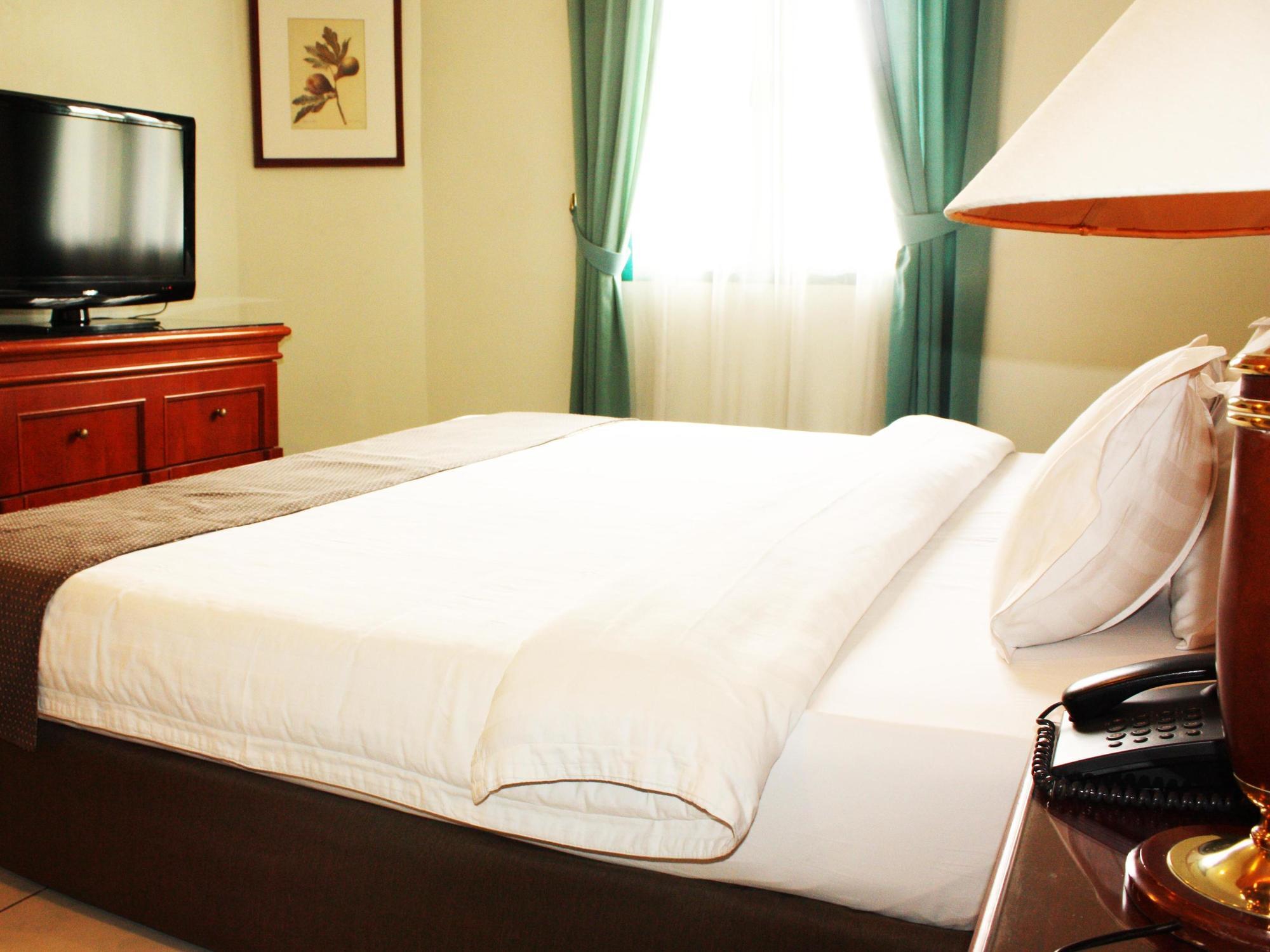 Travellers Suites Serviced Apartments Medan Buitenkant foto