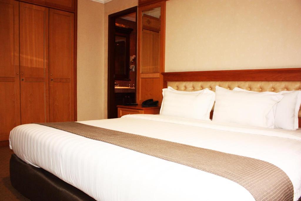 Travellers Suites Serviced Apartments Medan Kamer foto