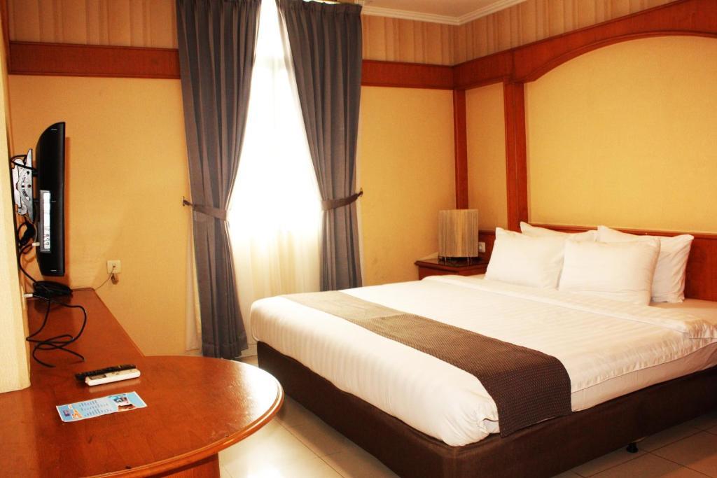 Travellers Suites Serviced Apartments Medan Kamer foto
